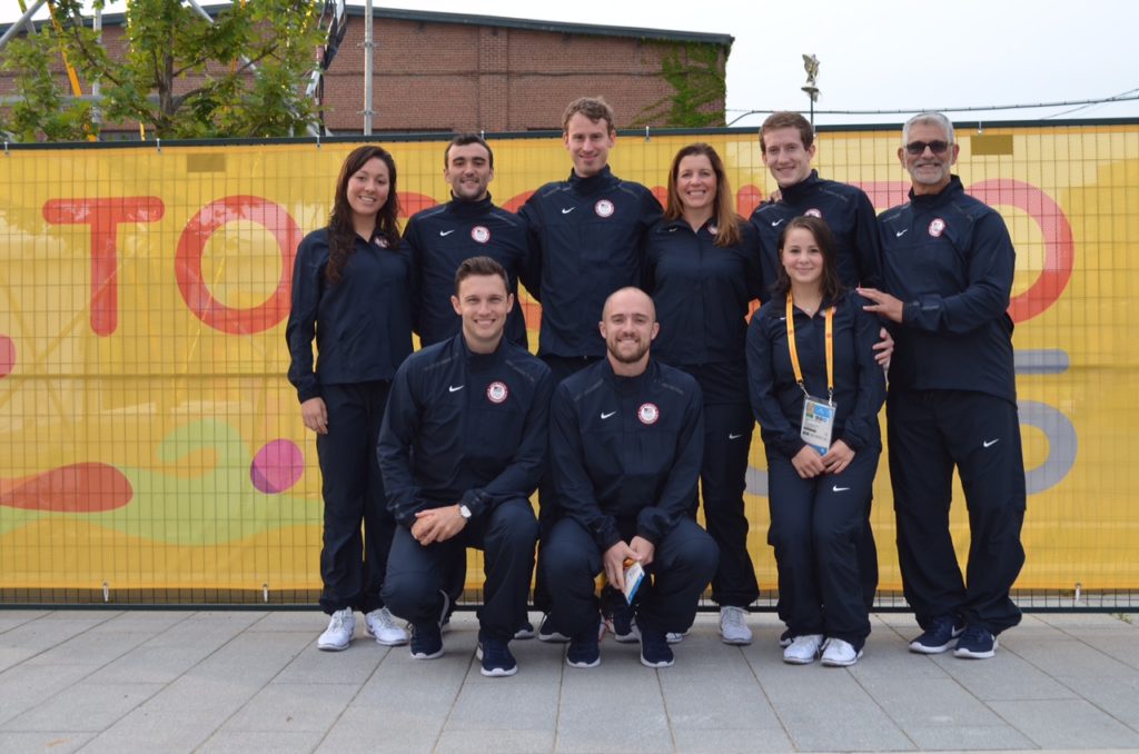 Team USA gathers in front of the official Pan American Games banner 