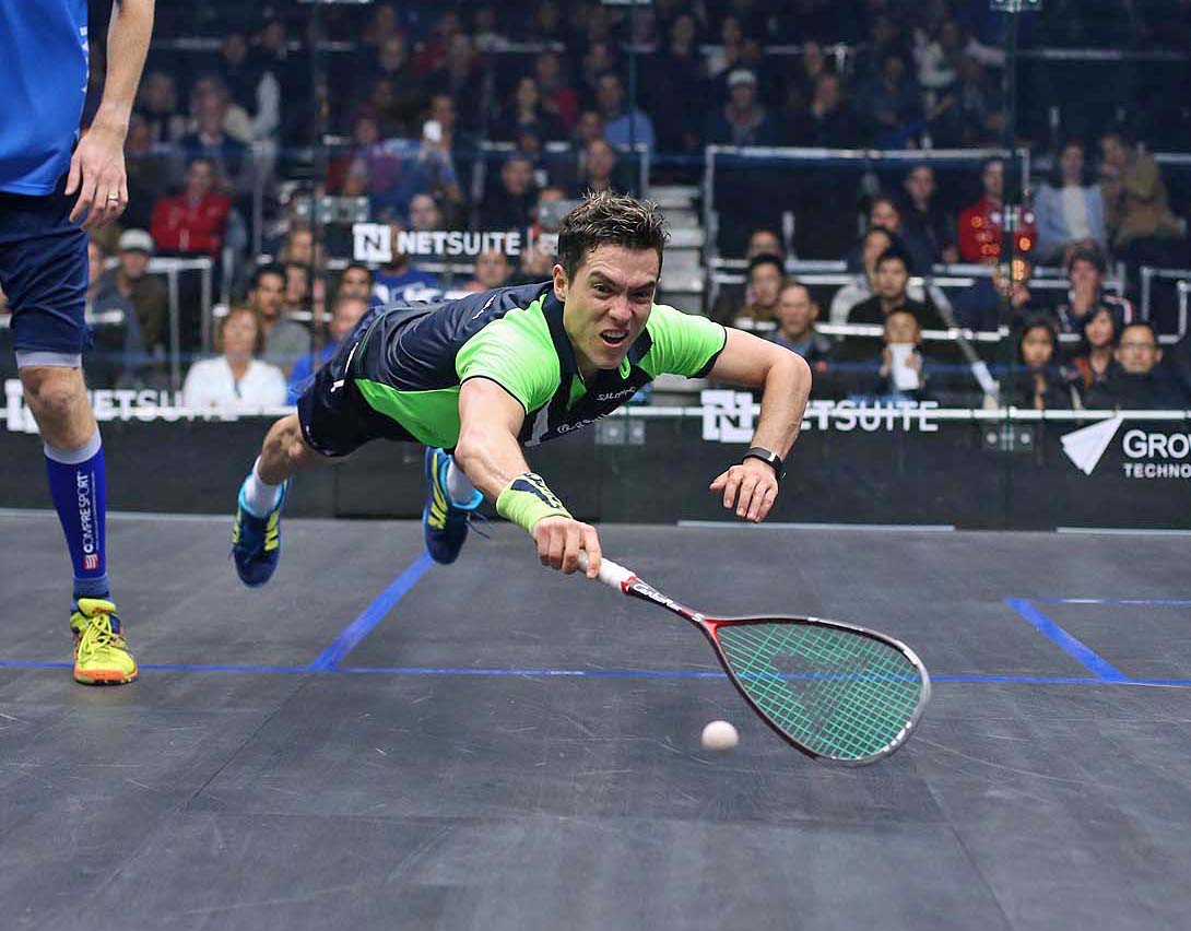 A trademark Rodriguez dive against Pilly. (image: Steve Line/squashpics.com)