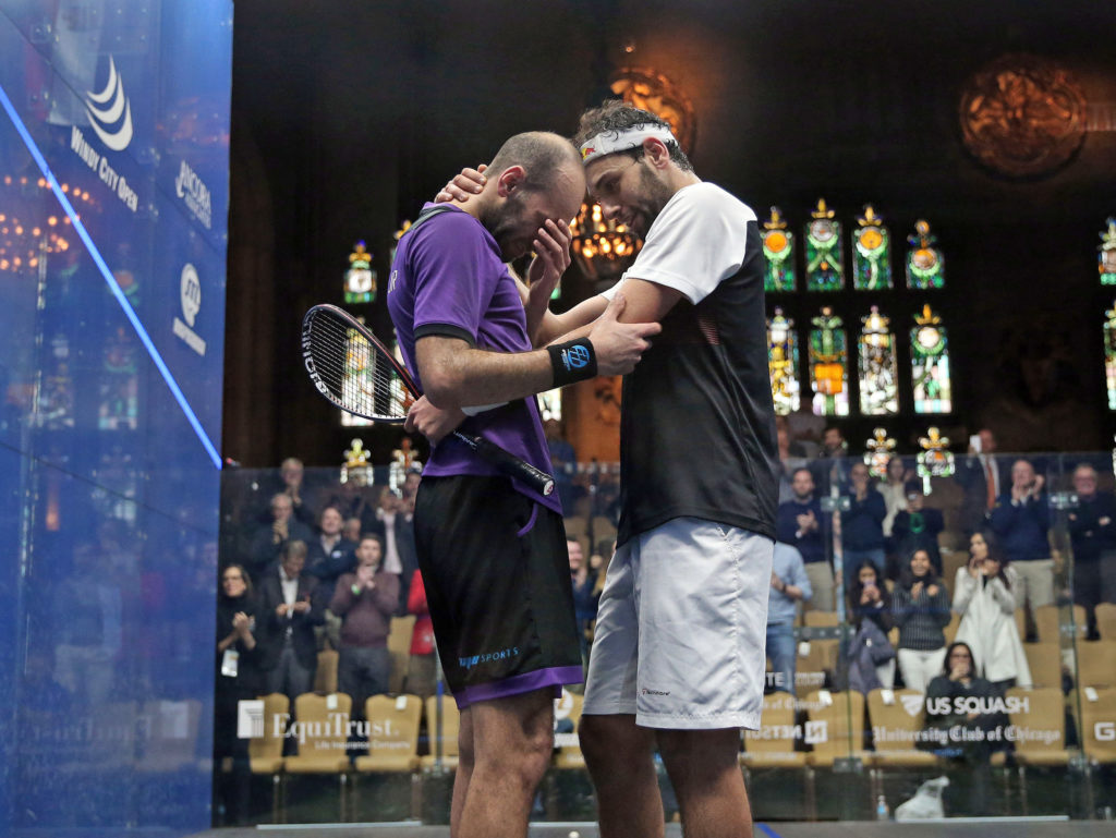 Elshorbagy brothers Marwan (l) and Mohamed embrace following a five-game battle. (image: squashpics.com)